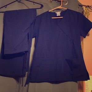 Navy blue scrub set. Top and bottoms both xs